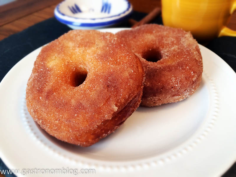 Biscuit doughnuts dusted in cinnamon and sugar